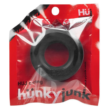 Hunkyjunk HUJ C Ring - Oxball in an artistic arrangement, focusing on its stretchy silicone material that enhances comfort and pleasure as a fine cock ring.